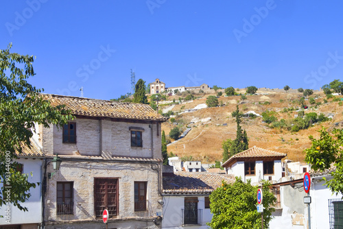 View Mirador Morente and Hermitage of San Miguel Alto Church from downtown in Granada, Spain