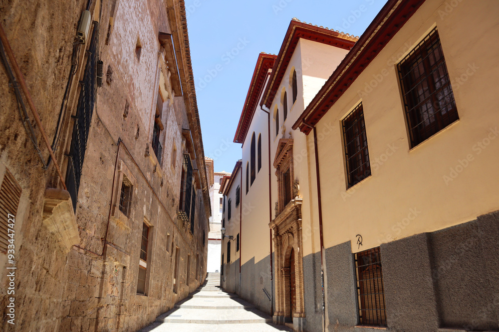 Narrow street of downtown in Granada, Spain Narrow street of downtown in Granada, Spain
