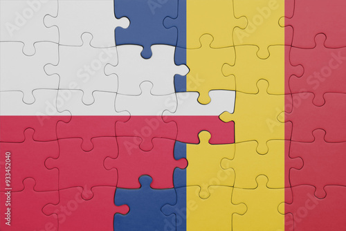 puzzle with the colourful national flag of romania and flag of poland.