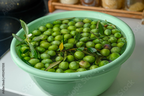 Green olives in liquid photo