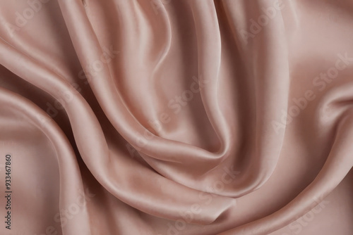 Texture of crumpled pink silk fabric, background