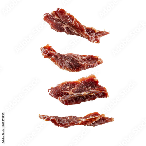 A few pieces of dried meat floating in the air isolated on a transparent background