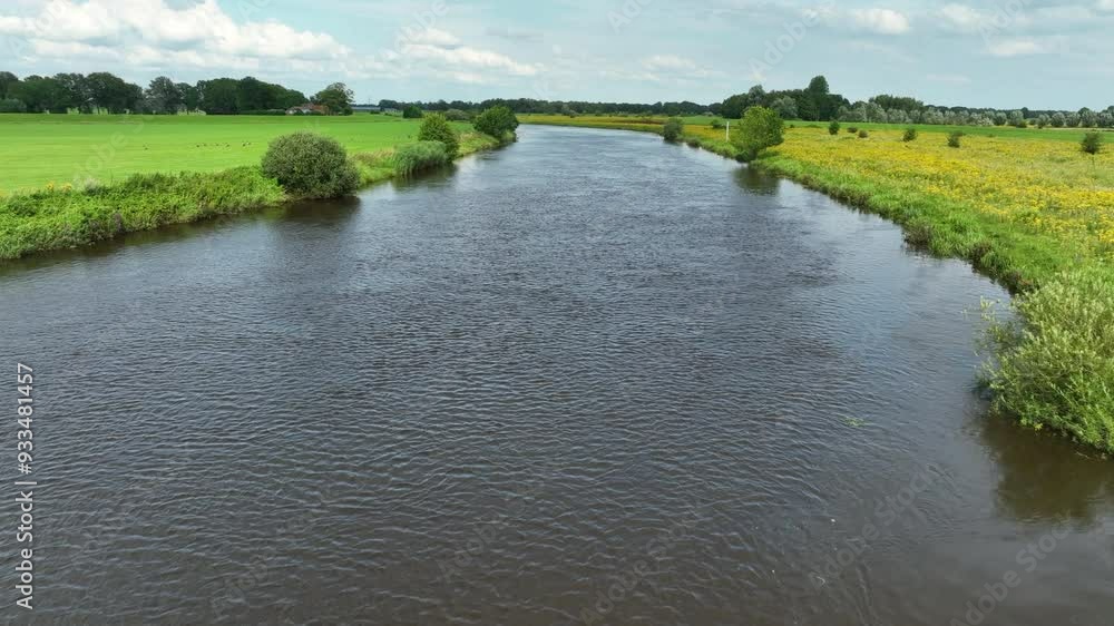 Overijsselse Vecht flowing through the summer landscape. Overijsselse Vecht flowing through the summer landscape.