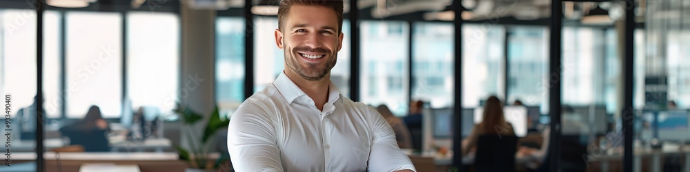 Businessman in a modern office with arms crossed, smiling confidently, realistic photo style. Businessman in a modern office with arms crossed, smiling confidently, realistic photo style.