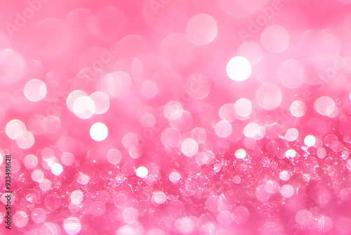 Abstract pink glitter and circle shaped bokeh on blurry background. Festive backdrop for holiday or event. Saint Valentine's day background.