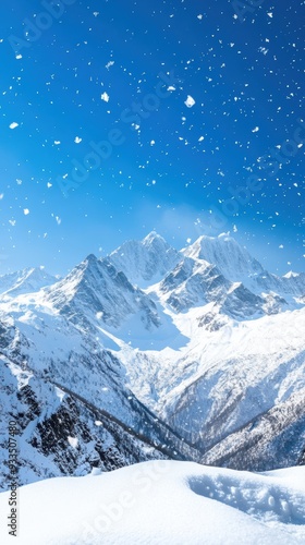 Pristine snow-capped mountains rise majestically under a clear blue sky, with delicate snowflakes swirling in the wind