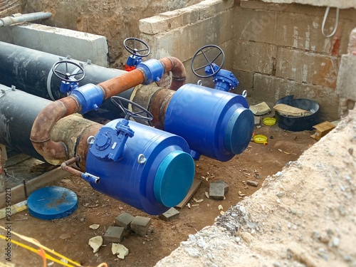 Replacement and repair of water supply pipes, heating mains, water pipes. The concept is a water supply accident. The valve is piped on the pipe. Photo 16:9.