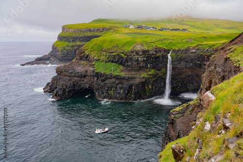 Vista de la cascada de Mullafossur en el pueblo  de  Gasaladur, Vágar, Islas Feroe  photo