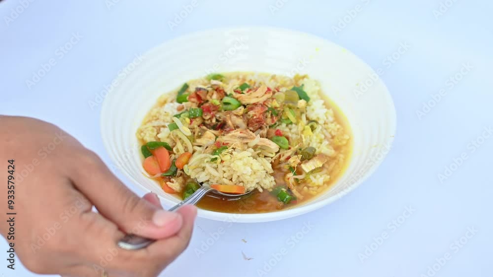 Soto ayam is a typical Indonesian food in the form of a kind of chicken soup with a yellowish sauce Soto ayam is a typical Indonesian food in the form of a kind of chicken soup with a yellowish sauce