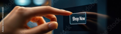 A hand poised to click Shop Now button conveys anticipation and eagerness for online shopping.