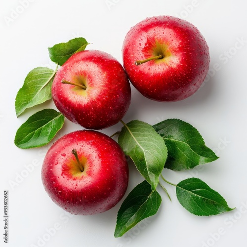 Red apple fruit with leaves close up isolated on white background