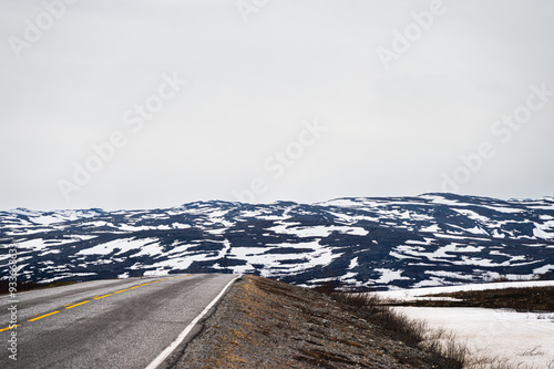 snowy landscape along the road from the island of Mageroya to Alta, Norway photo