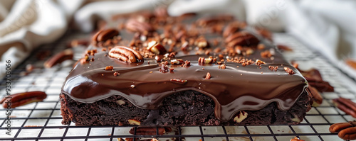 Chocolate sheet cake with frosting and pecans