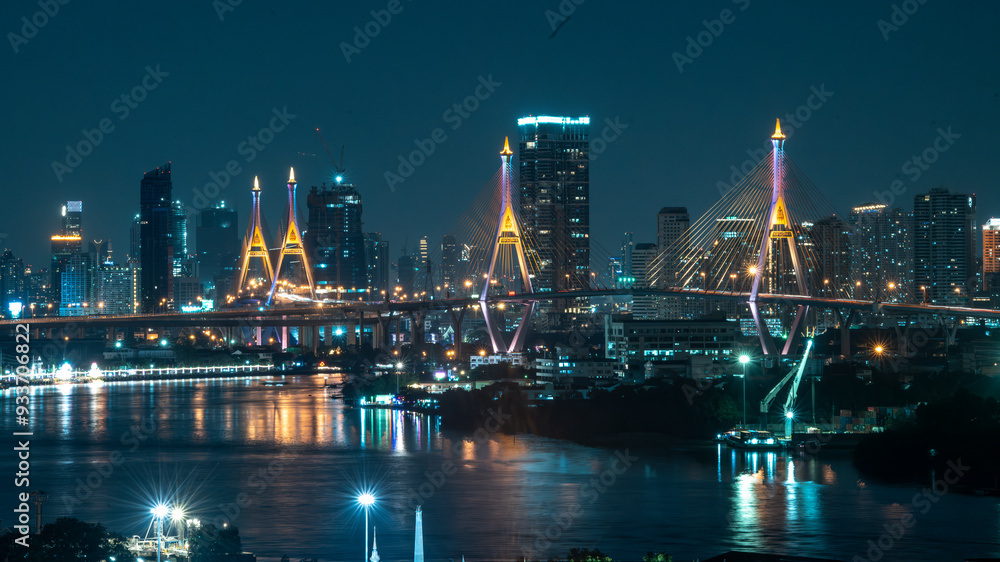 Fototapeta premium Bhumibol Bridge 1 and 2 with beautiful light up at night scene, Bangkok Thailand