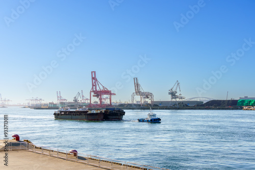 Sailing ships  through Osaka port , Marine cargo, large port city and commercial center on the Japanese island of Honshu, Osaka, Japan. photo