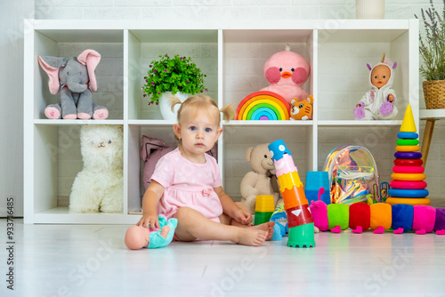 little girl is playing with toys. Selective focus