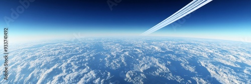 As an aircraft crosses the vast blue skies it creates a flash of white, a moment of harmony with nature