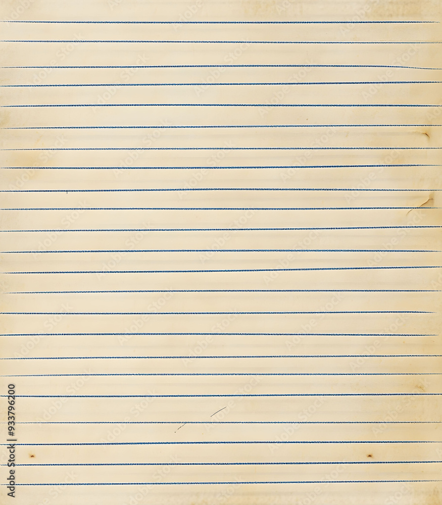 Obraz premium The lined notebook page features a vintage appearance with slightly yellowed edges and signs of wear.