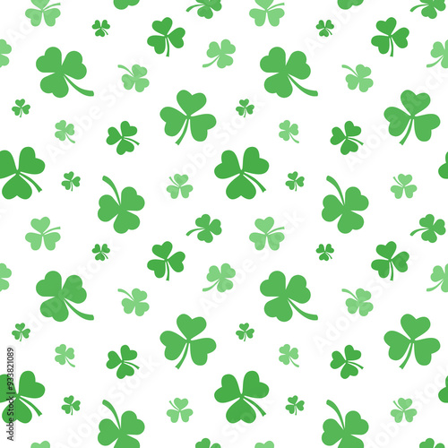 Seamless pattern of green clover leaves isolated on white background for Saint Patrick's Day.