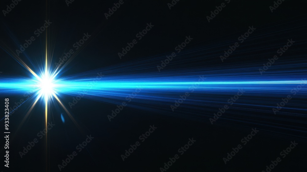 Fototapeta premium Bright blue ray of light cutting through darkness, symbolizing speed and precision in modern technology.