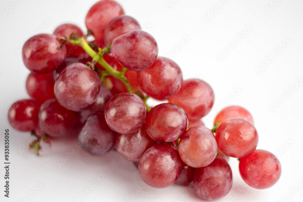 Red grape isolated on white background. Clipping path. Red grape isolated on white background. Clipping path.