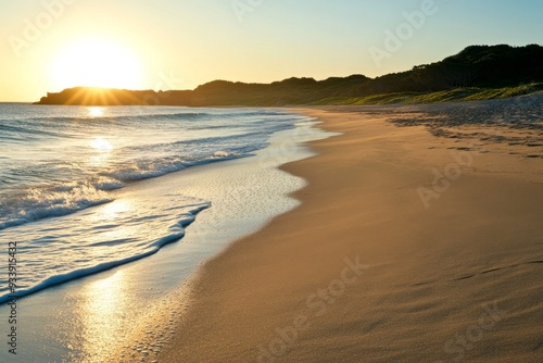 Wallpaper Mural Tranquil Beach at Dawn with Smooth Sand and Golden Glow with Copy Space Torontodigital.ca