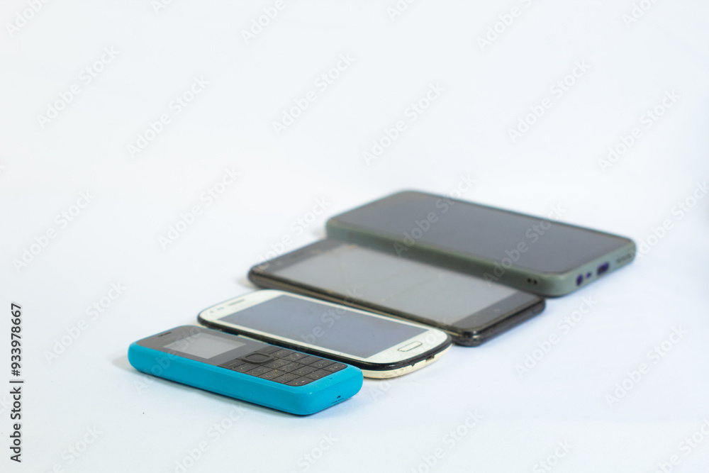collection of mobile phones from year to year in photo from top side angle with isolated white background collection of mobile phones from year to year in photo from top side angle with isolated white background