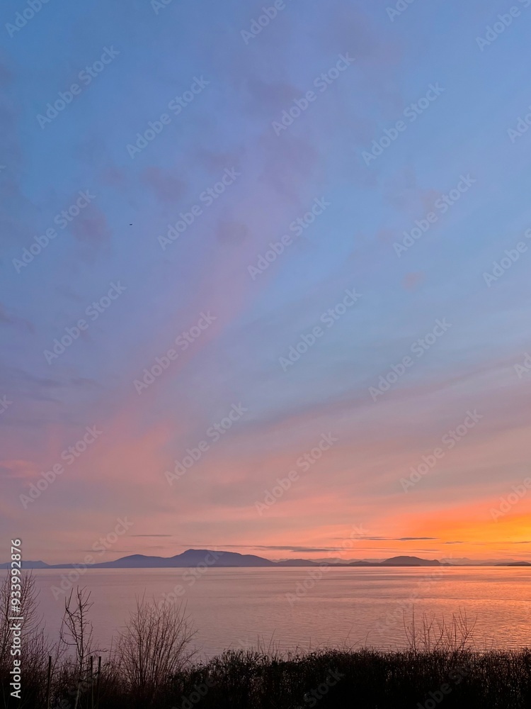 Sunset over the Strait of Georgia looking towards Orcas and Sucia islands, WA Sunset over the Strait of Georgia looking towards Orcas and Sucia islands, WA