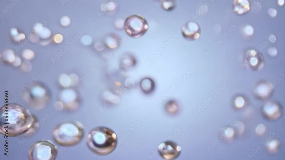 Liquid pearls in mother-of-pearl shades slowly flow into one another and create mystical formations. Liquid pearls in mother-of-pearl shades slowly flow into one another and create mystical formations.