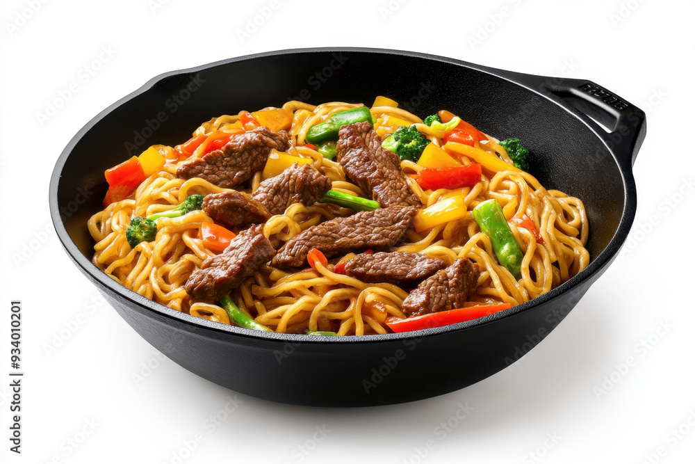 Sizzling Stir-Fried Noodles with Beef and Colorful Vegetables in a Cast Iron Pan Sizzling Stir-Fried Noodles with Beef and Colorful Vegetables in a Cast Iron Pan
