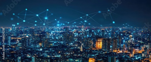 Modern city with wireless network connection and city scape concept.Wireless network and Connection technology concept with city background at night.