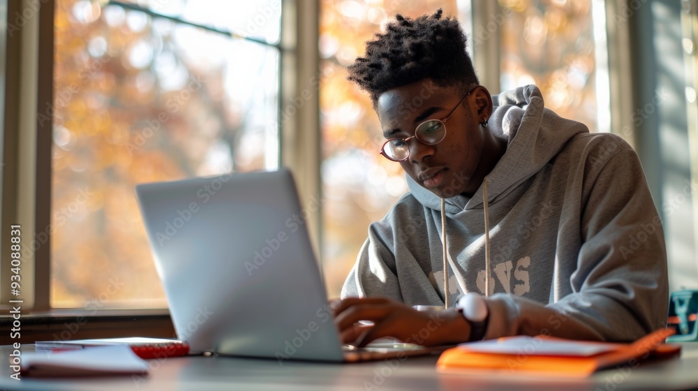 Young Black Man Studying on Laptop. Young Black Man Studying on Laptop.