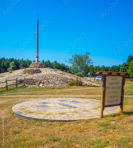 Wallpaper Mural Foncebadon, Spain - August 5, 2024. The iconic Cruz de Ferro, a significant landmark on the Camino de Santiago, near Foncebadon. Castilla y Leon, Spain. Torontodigital.ca