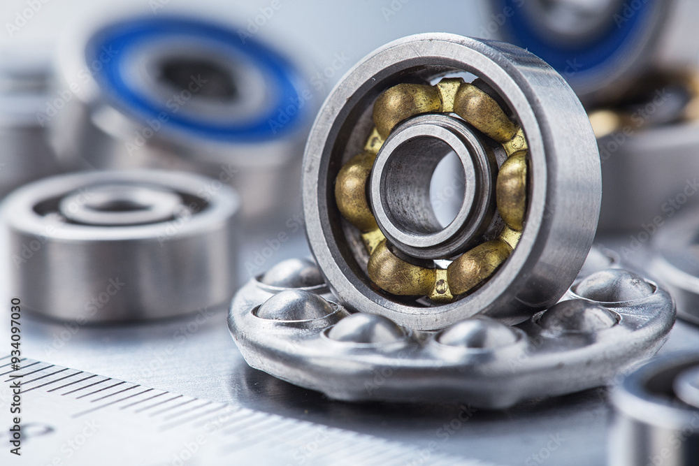 different bearings on a metal background. Part of mechanism. different bearings on a metal background. Part of mechanism.