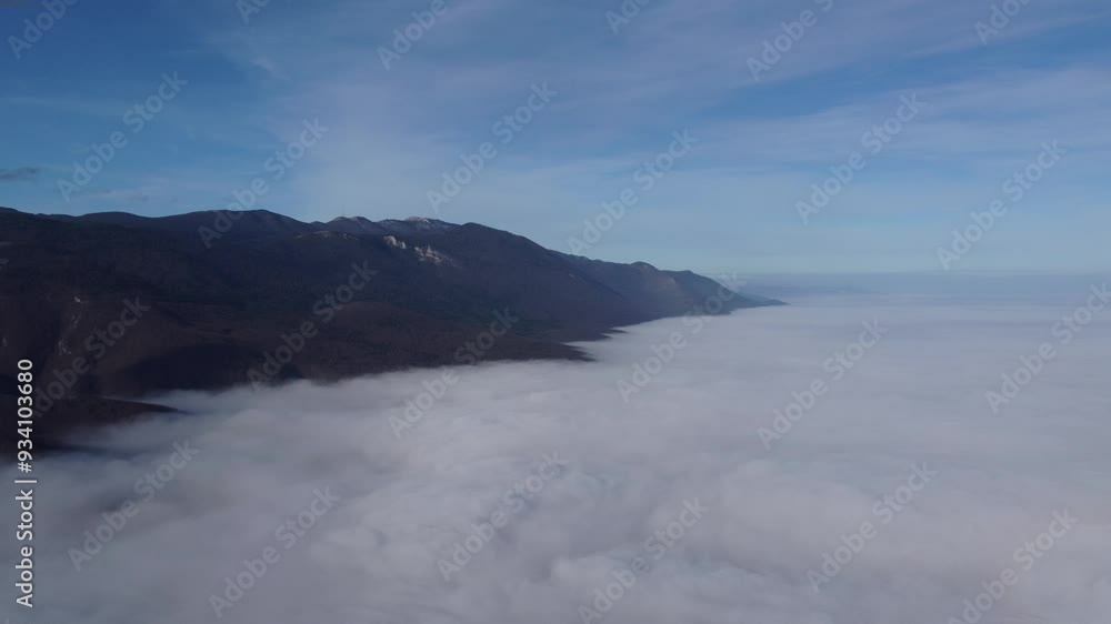 Fog under the mountain