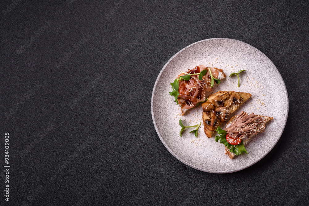 Variation of several toasts or bruschetta with prosciutto, mushrooms and veal Variation of several toasts or bruschetta with prosciutto, mushrooms and veal