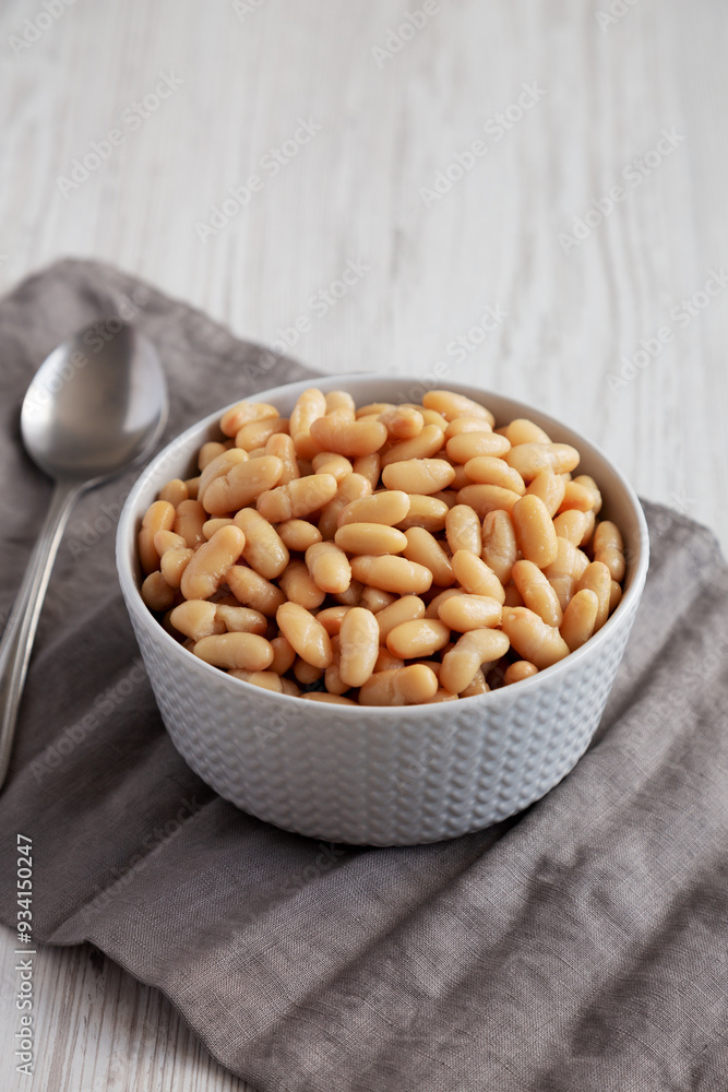 Canned White Cannellini Beans in a Bowl, side view. Canned White Cannellini Beans in a Bowl, side view.