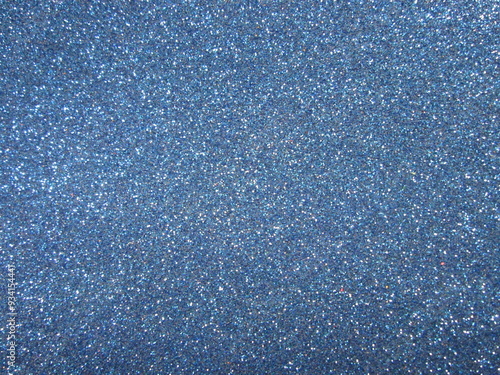 The shimmering blue glitter creates a captivating backdrop perfect for a variety of creative projects. It enhances decorative items, adding sparkle and flair