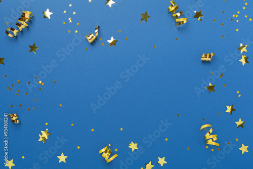Golden gift boxes and confetti on color background, top view