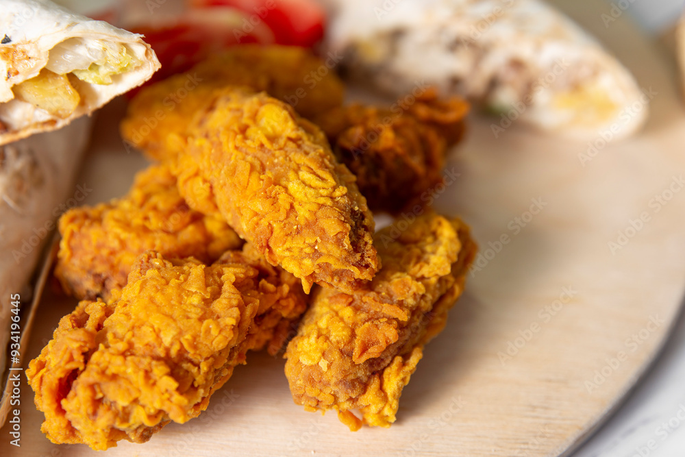 fried chicken legs and wings close up fried chicken legs and wings close up