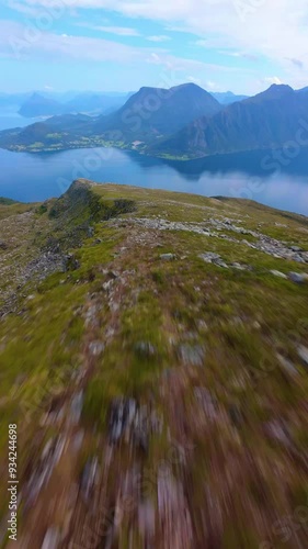 Drone flying like a bird in the Norwegian mountains in summer.