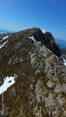 Drone flying like a bird in the Norwegian mountains in summer.
