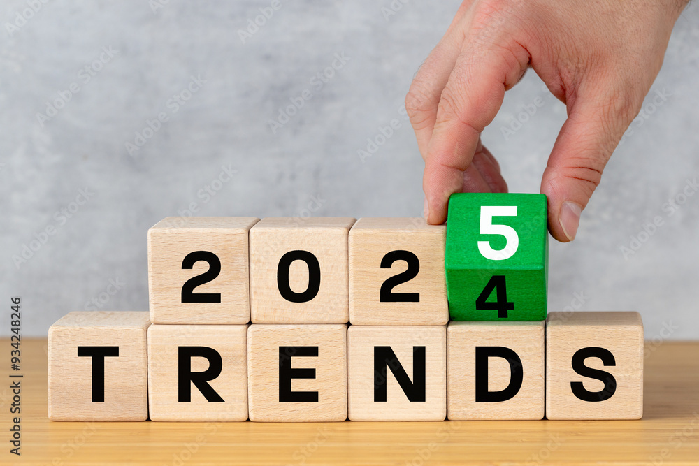 Trends 2025 concept of the year. Concept and business plan to optimize 2025 marketing trends in the new year 2025. Find new and information. hand turning green block from 4 to 5, positive symbol