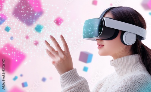 Young woman interacting with virtual reality technology in a colorful digital...