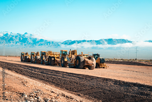 Heavy Machinery in Desert Mountain Landscape