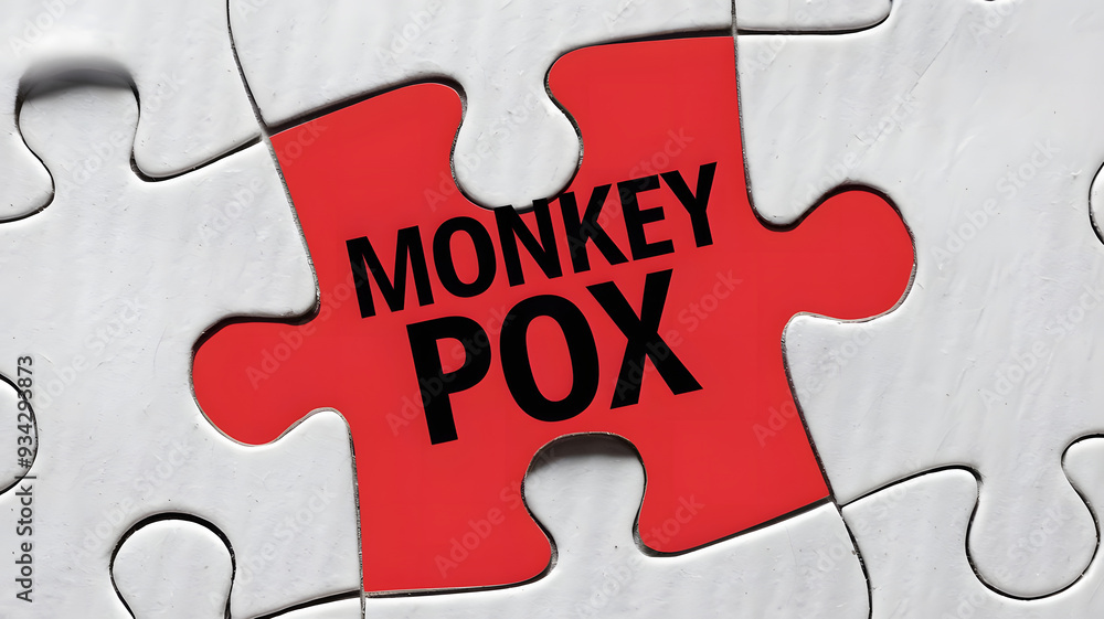 A white puzzle piece background features a prominent red puzzle piece with the text MONKEY POX in bold black letters. A white puzzle piece background features a prominent red puzzle piece with the text MONKEY POX in bold black letters.