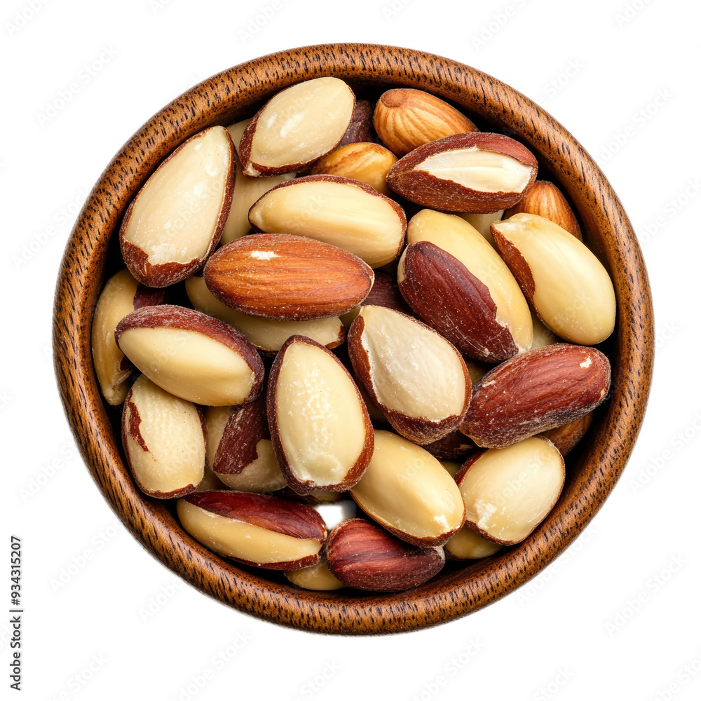 Top view shelled Brazil nuts packed in wooden bowl isolated on transparent background Top view shelled Brazil nuts packed in wooden bowl isolated on transparent background