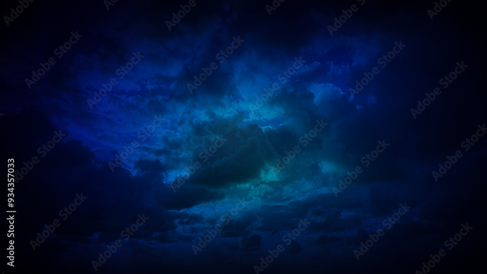 Fototapeta premium A deep blue-toned cloudscape, evoking a sense of calm and mystery. Perfect for 4K backgrounds, digital art, and creative projects needing a serene atmosphere