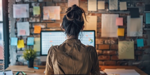 Back View of Digital Content Specialist Brainstorming Marketing Campaign in Office