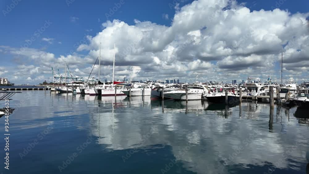 Miami, Florida, USA - June 19, 2024: Luxury boat motor yacht in Biscayne Bay marina. Sailboat harbor with yacht marina. Sailing and yachting tourism. Luxury life. Summer vacation. Yacht at sea port Miami, Florida, USA - June 19, 2024: Luxury boat motor yacht in Biscayne Bay marina. Sailboat harbor with yacht marina. Sailing and yachting tourism. Luxury life. Summer vacation. Yacht at sea port